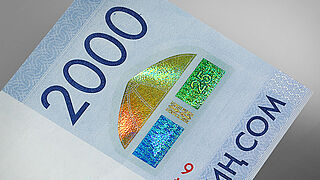 Close-up on KINEGRAM COLORS® Patch used on the 2000 Som banknote from Kyrgyzstan
