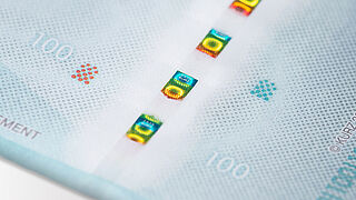 Close-up of a sample note that incorporates a KURZ THREAD with FLUX effect