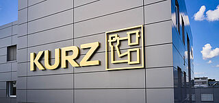 KURZ is a landmark in the Bavarian city of Fürth Close-up of KURZ headquarters building with logo attached