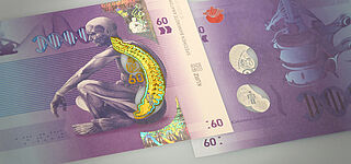 At the core of banknote security: KINEGRAM COLORS® Stripe over Window Image of a sample banknote with an anatomical design and KINEGRAM COLORS® Stripe over Window