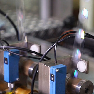 Close-up of the foil detection sensors in an application machine