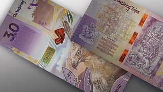 Image of an Indonesian sample banknote with KINEGRAM COLORS® technology, used in a surface-applied feature and in a security thread