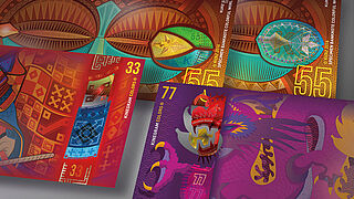 Close-up of four sample banknotes demonstrating KINEGRAM COLORS® technology